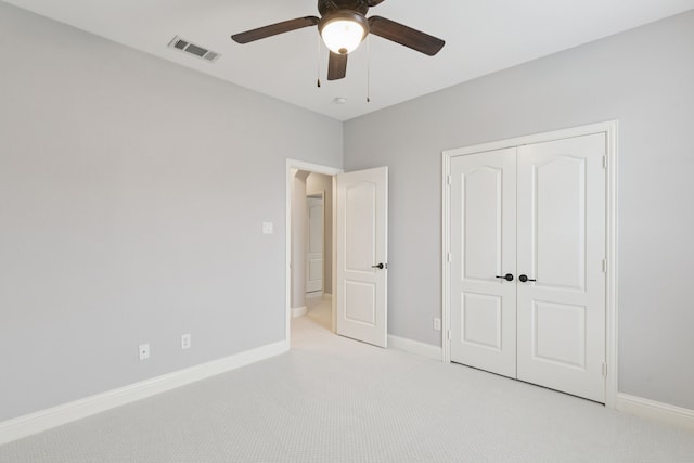 3711 Venice Dr, Irving, TX 75038 - unfurnished bedroom featuring light colored carpet, a closet, baseboards, and ceiling fan