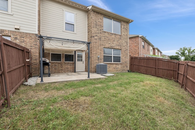 3711 Venice Dr, Irving, TX 75038 - back of house featuring brick siding, a patio, and central air condition unit