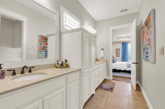 2116 Tremont Blvd, Mckinney, TX 75071 - ensuite bathroom with double vanity and tile patterned floors
