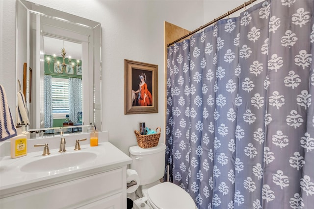 2116 Tremont Blvd, Mckinney, TX 75071 - bathroom with vanity, a chandelier, and a shower with shower curtain