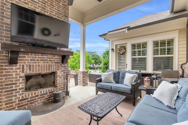 2116 Tremont Blvd, Mckinney, TX 75071 - view of patio / terrace featuring an outdoor living space with a fireplace