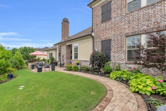 2116 Tremont Blvd, Mckinney, TX 75071 - view of grassy yard with a patio