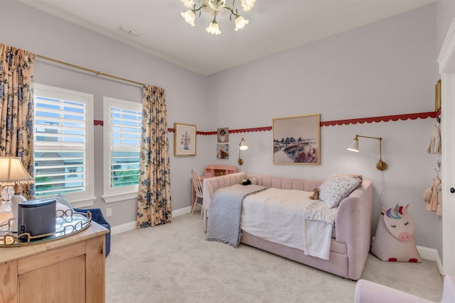 2116 Tremont Blvd, Mckinney, TX 75071 - carpeted bedroom featuring a chandelier and baseboards