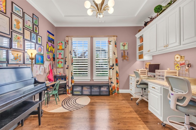 2116 Tremont Blvd, Mckinney, TX 75071 - office area with a chandelier, light wood-type flooring, built in desk, and ornamental molding