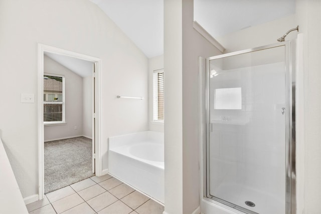 13209 Fencerow Rd, Fort Worth, TX 76244 - full bathroom with vaulted ceiling, a stall shower, a bath, tile patterned floors, and baseboards