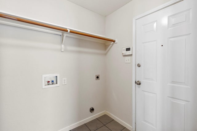 13209 Fencerow Rd, Fort Worth, TX 76244 - laundry area with electric dryer hookup, hookup for a washing machine, dark tile patterned flooring, and baseboards