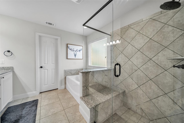 1925 Knoxbridge Rd, Forney, TX 75126 - full bath with a garden tub, a stall shower, tile patterned flooring, vanity, and baseboards