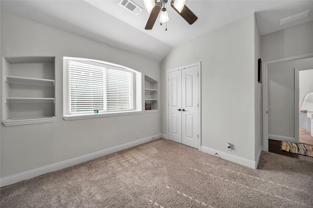 1925 Knoxbridge Rd, Forney, TX 75126 - unfurnished bedroom featuring carpet floors, a closet, baseboards, lofted ceiling, and a ceiling fan