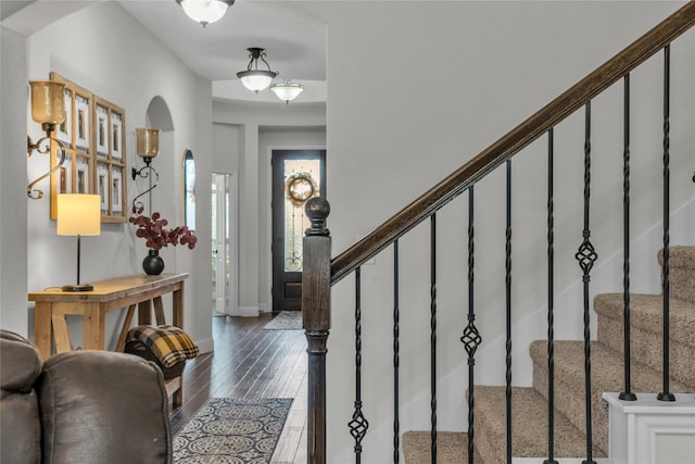 1925 Knoxbridge Rd, Forney, TX 75126 - entrance foyer with stairway, arched walkways, wood-type flooring, and baseboards