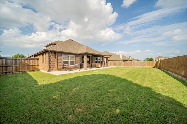 1925 Knoxbridge Rd, Forney, TX 75126 - back of house featuring brick siding, a patio, and roof with shingles