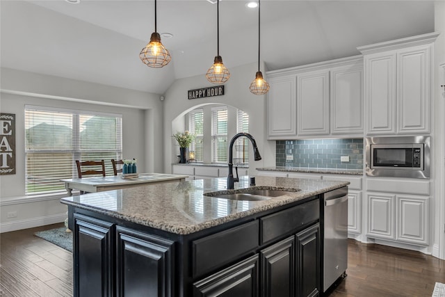 1925 Knoxbridge Rd, Forney, TX 75126 - kitchen with a sink, appliances with stainless steel finishes, dark cabinetry, white cabinets, and dark wood-style floors