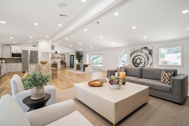 4336 Irvin Simmons Dr, Dallas, TX 75229 - living room featuring light wood-style flooring and recessed lighting
