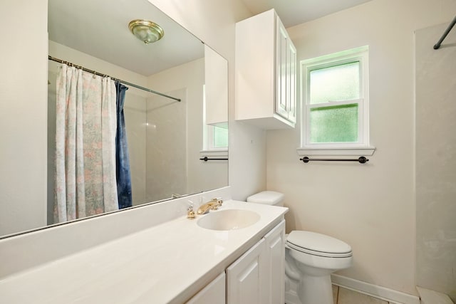 2050 Greenbriar Dr, Abilene, TX 79605 - full bath featuring toilet, vanity, a shower with shower curtain, and baseboards
