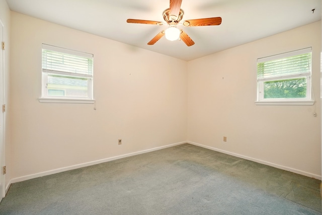 2050 Greenbriar Dr, Abilene, TX 79605 - spare room with carpet floors, baseboards, and ceiling fan