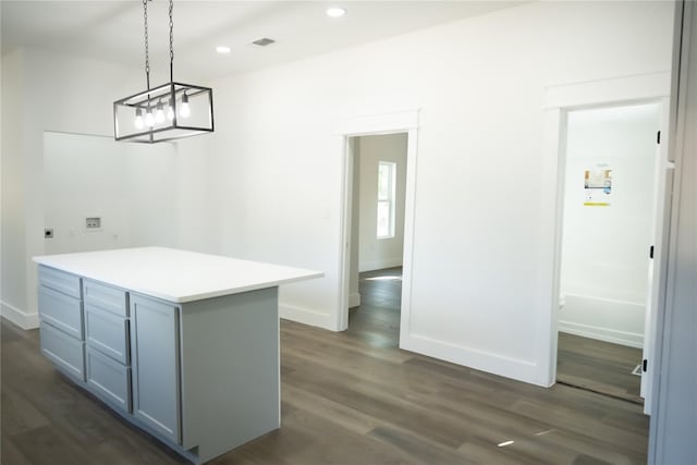 309 E Cheek St, Saint Jo, TX 76265 - unfurnished dining area featuring recessed lighting, dark wood-style floors, and baseboards