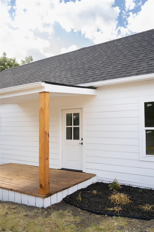 309 E Cheek St, Saint Jo, TX 76265 - property entrance featuring roof with shingles