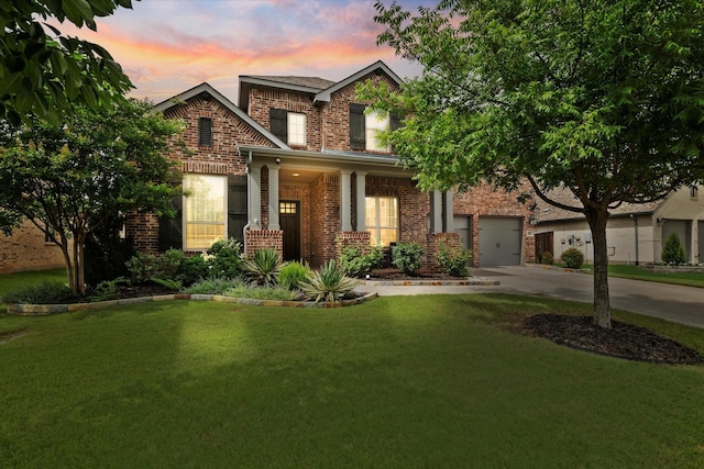 350 Lake Trail Ln, Prosper, TX 75078 - view of front of house featuring driveway, brick siding, a lawn, and a garage