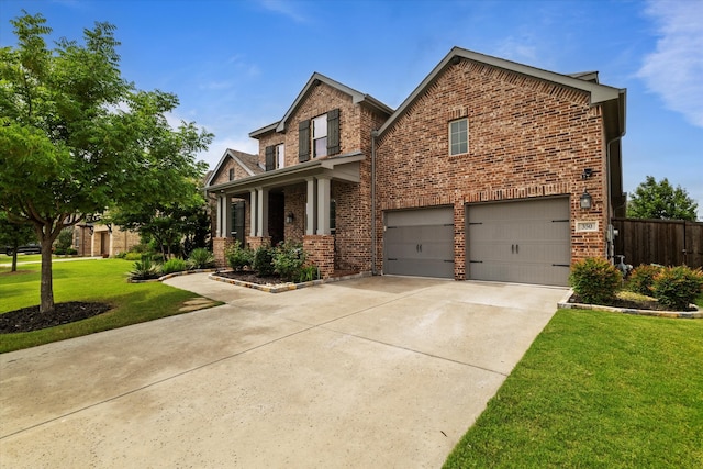 350 Lake Trail Ln, Prosper, TX 75078 - view of front of property with brick siding, an attached garage, and concrete driveway