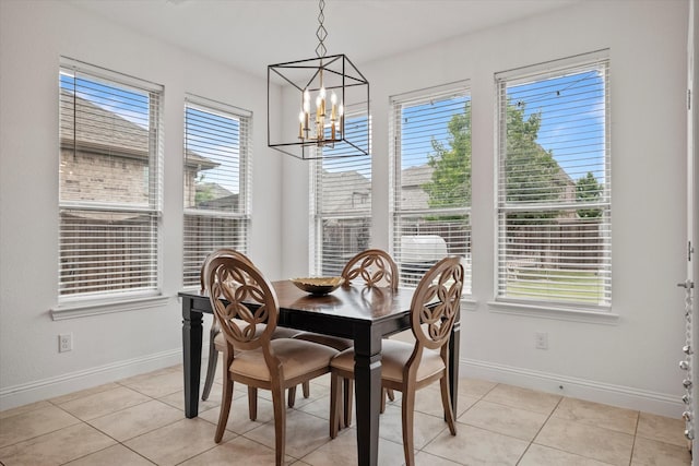 350 Lake Trail Ln, Prosper, TX 75078 - dining room with plenty of natural light, a chandelier, and baseboards