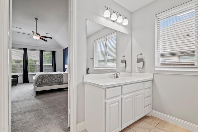 350 Lake Trail Ln, Prosper, TX 75078 - bathroom with vanity, ceiling fan, baseboards, vaulted ceiling, and connected bathroom
