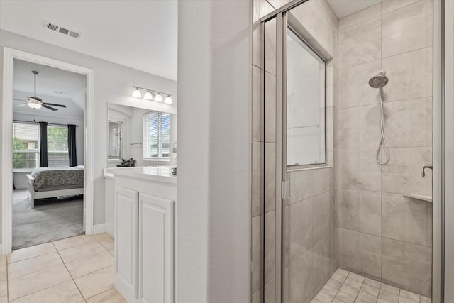 350 Lake Trail Ln, Prosper, TX 75078 - ensuite bathroom featuring a stall shower, vanity, ceiling fan, and tile patterned floors
