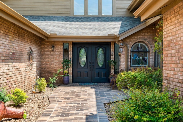 5325 Seascape Ln, Plano, TX 75093 - doorway to property with a shingled roof, brick siding, and french doors
