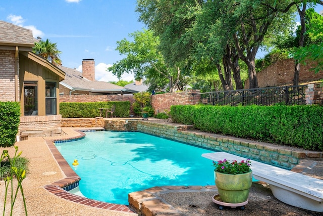 5325 Seascape Ln, Plano, TX 75093 - view of swimming pool with a fenced backyard and a diving board
