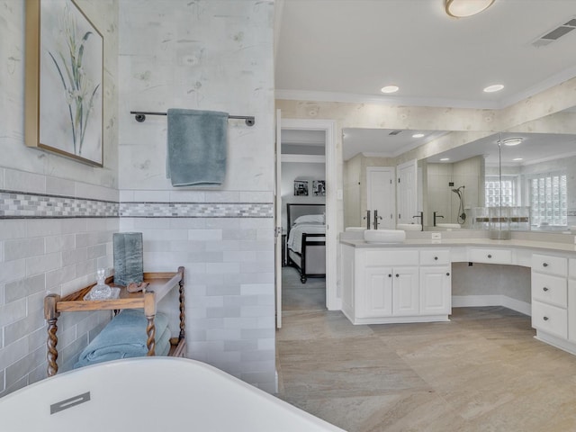 6321 Fershaw Pl, Fort Worth, TX 76116 - full bath with vanity, a soaking tub, crown molding, tile walls, and ensuite bathroom