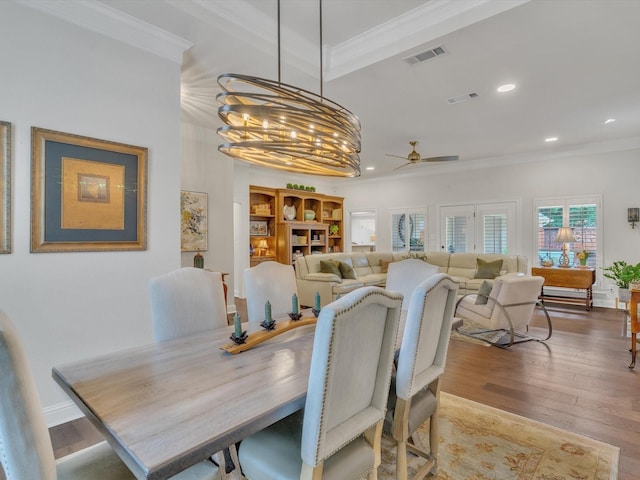 6321 Fershaw Pl, Fort Worth, TX 76116 - dining area with ornamental molding, a ceiling fan, wood finished floors, recessed lighting, and a chandelier