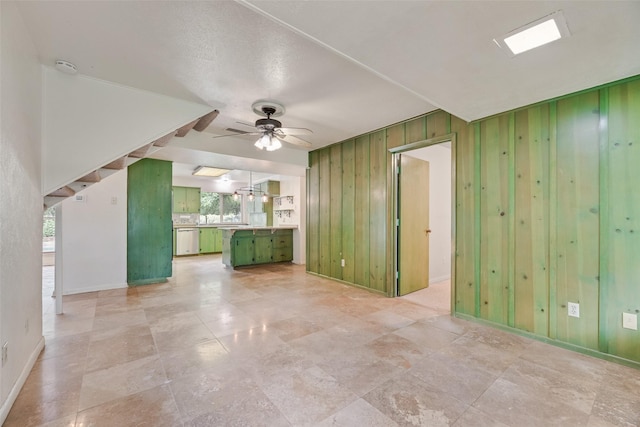 4 Waterview Pl, Richardson, TX 75080 - spare room featuring a ceiling fan, wood walls, baseboards, and a smoke detector