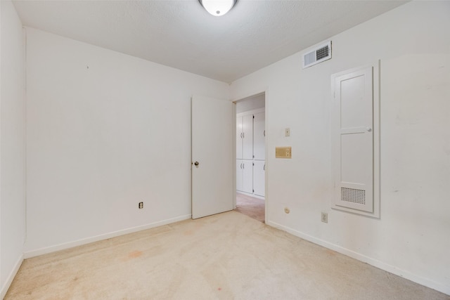 4 Waterview Pl, Richardson, TX 75080 - spare room featuring light carpet and baseboards