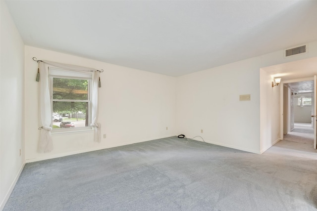 4 Waterview Pl, Richardson, TX 75080 - spare room featuring light colored carpet and baseboards