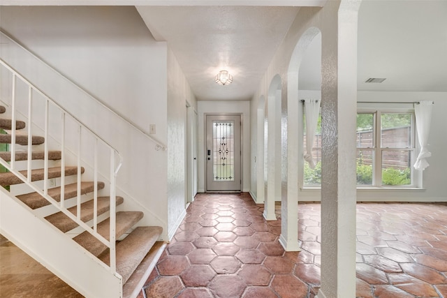 4 Waterview Pl, Richardson, TX 75080 - entryway featuring arched walkways and stairs