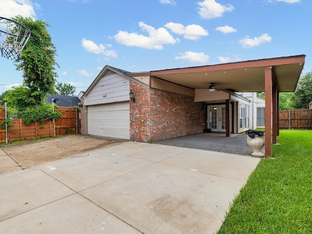 1640 Lemonwood Cir, Mesquite, TX 75149 - view of front of house featuring french doors, driveway, ceiling fan, and brick siding
