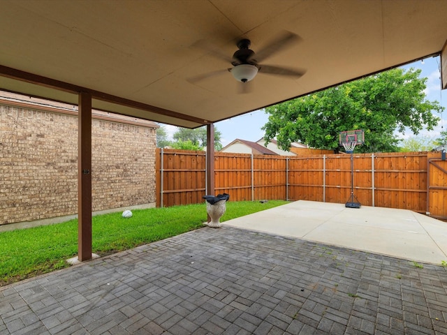 1640 Lemonwood Cir, Mesquite, TX 75149 - fenced backyard with ceiling fan and a patio