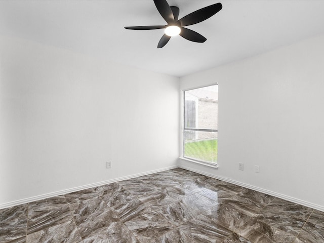 1640 Lemonwood Cir, Mesquite, TX 75149 - empty room with ceiling fan, baseboards, and marble finish flooring