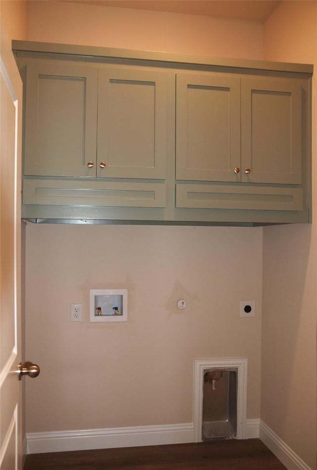 701 Raylan St, Springtown, TX 76082 - laundry room with electric dryer hookup, washer hookup, cabinet space, baseboards, and gas dryer hookup