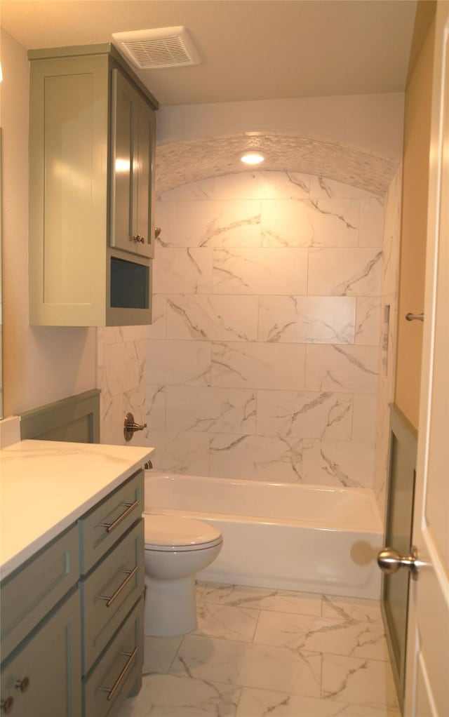 701 Raylan St, Springtown, TX 76082 - bathroom featuring vanity, marble finish floors, toilet, and shower / bath combination