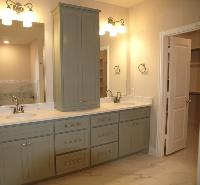 701 Raylan St, Springtown, TX 76082 - full bathroom featuring double vanity, a closet, marble look tiles, and a tub to relax in