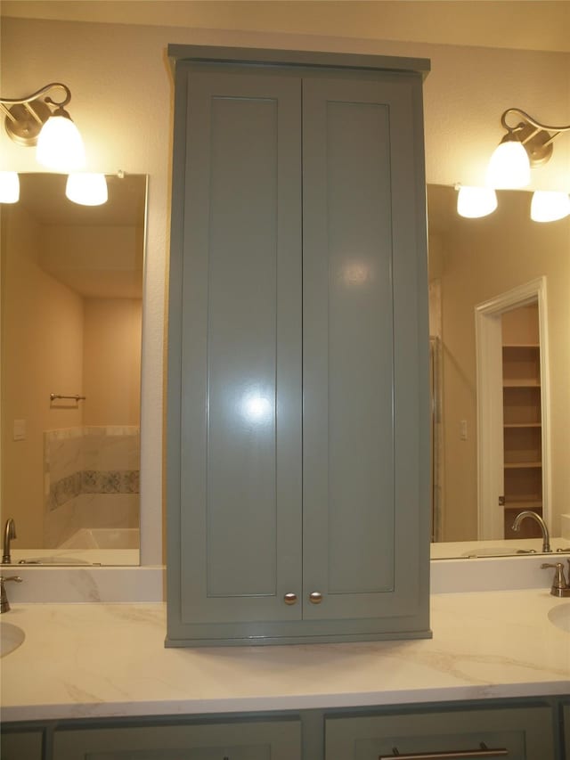 701 Raylan St, Springtown, TX 76082 - full bathroom featuring a garden tub and double vanity