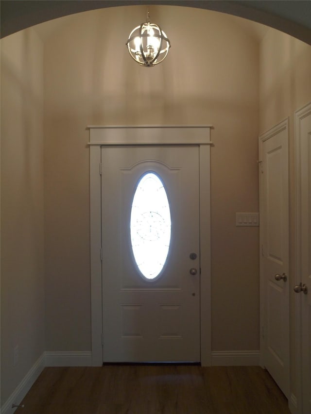 701 Raylan St, Springtown, TX 76082 - entryway featuring a chandelier, wood finished floors, and baseboards
