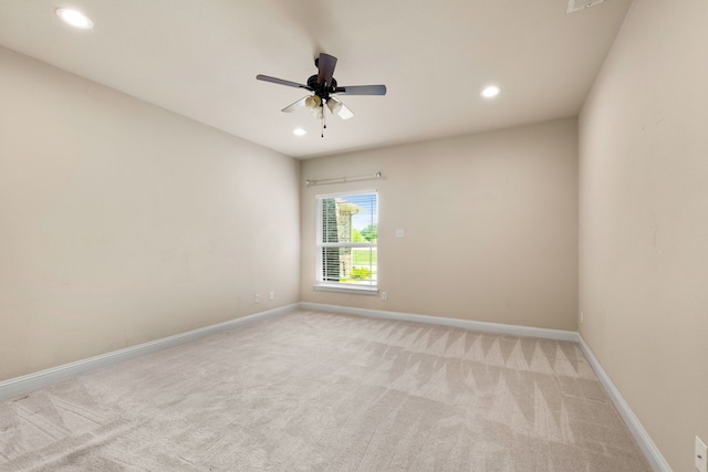 7603 Cousteau Dr, Rowlett, TX 75088 - empty room featuring light colored carpet, recessed lighting, baseboards, and ceiling fan