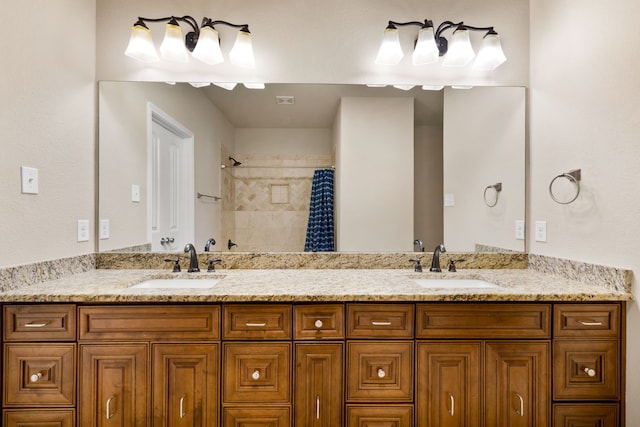 7603 Cousteau Dr, Rowlett, TX 75088 - full bathroom featuring double vanity and a tile shower