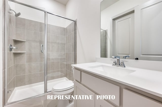 3109 Blake Dr, Mckinney, TX 75071 - bathroom featuring vanity, a stall shower, and toilet
