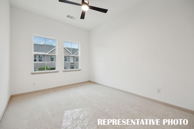 5236 Legacy St, Haltom City, TX 76117 - unfurnished room with carpet floors, ceiling fan, and baseboards