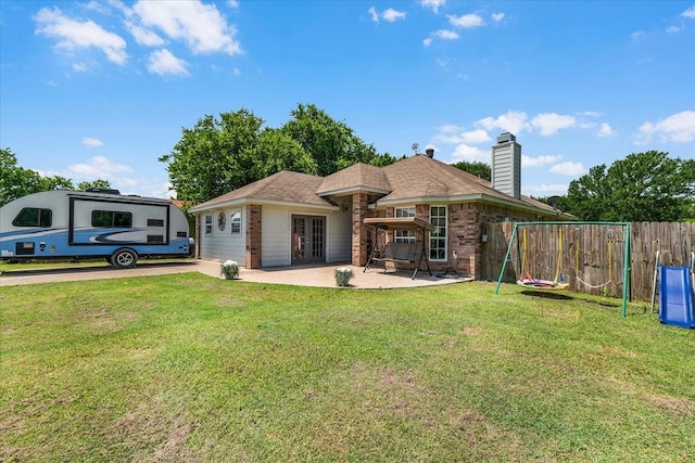 5212 Cross Timber Rd W, Cleburne, TX 76031 - rear view of house with french doors, a chimney, brick siding, and a patio