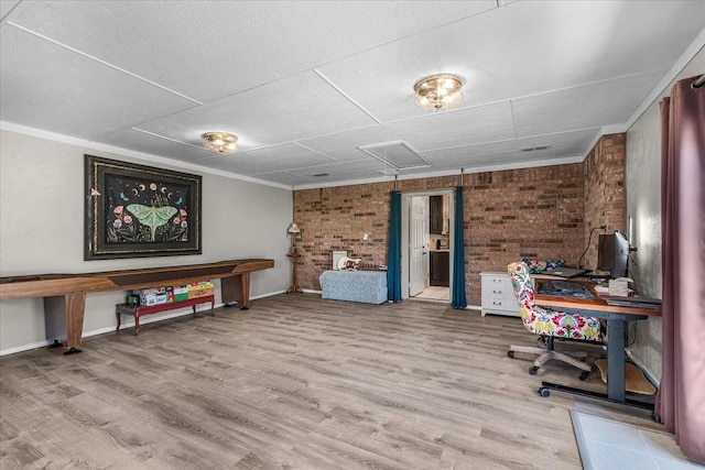 5212 Cross Timber Rd W, Cleburne, TX 76031 - office featuring brick wall, wood finished floors, and crown molding