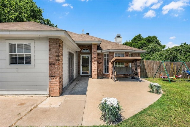 5212 Cross Timber Rd W, Cleburne, TX 76031 - view of patio featuring a playground