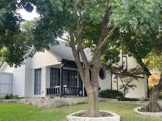 2510 Plumdale Dr, Carrollton, TX 75006 - back of house with a lawn