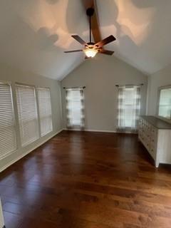 2510 Plumdale Dr, Carrollton, TX 75006 - unfurnished living room featuring a ceiling fan and wood finished floors